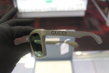 Gucci GG1570S‑005 57 Men’s Sunglasses | Dark Green Injection Frame |Authentic Luxury (UPC 889652469065)